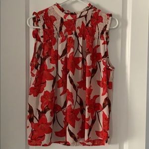 Beautiful tropical floral print sleeveless blouse